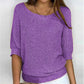 Solid color sweater with a round neckline and 3/4 sleeves